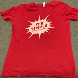 Large Canvas brand shirt with Christian related design.